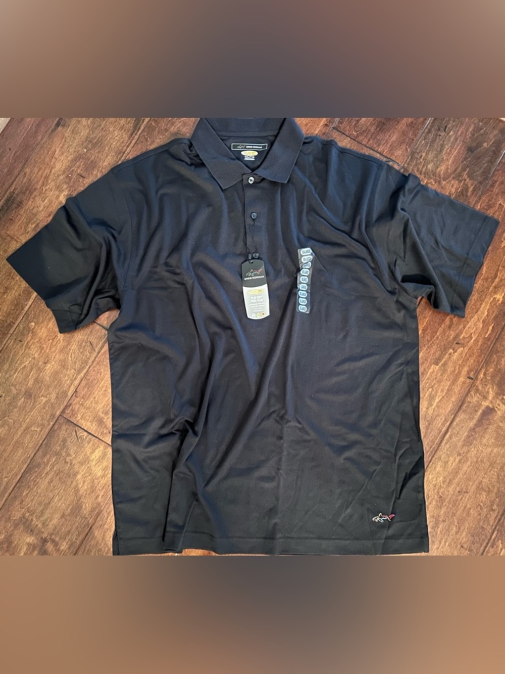Men’s size XXL black polo. NWT! Greg Norman
